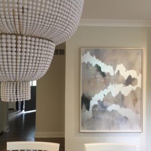 chandilier A close-up shot of a chandelier in a dining room