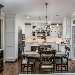 preservation-and-renovation-kitchen Decorative dining room table set on a wood floor.